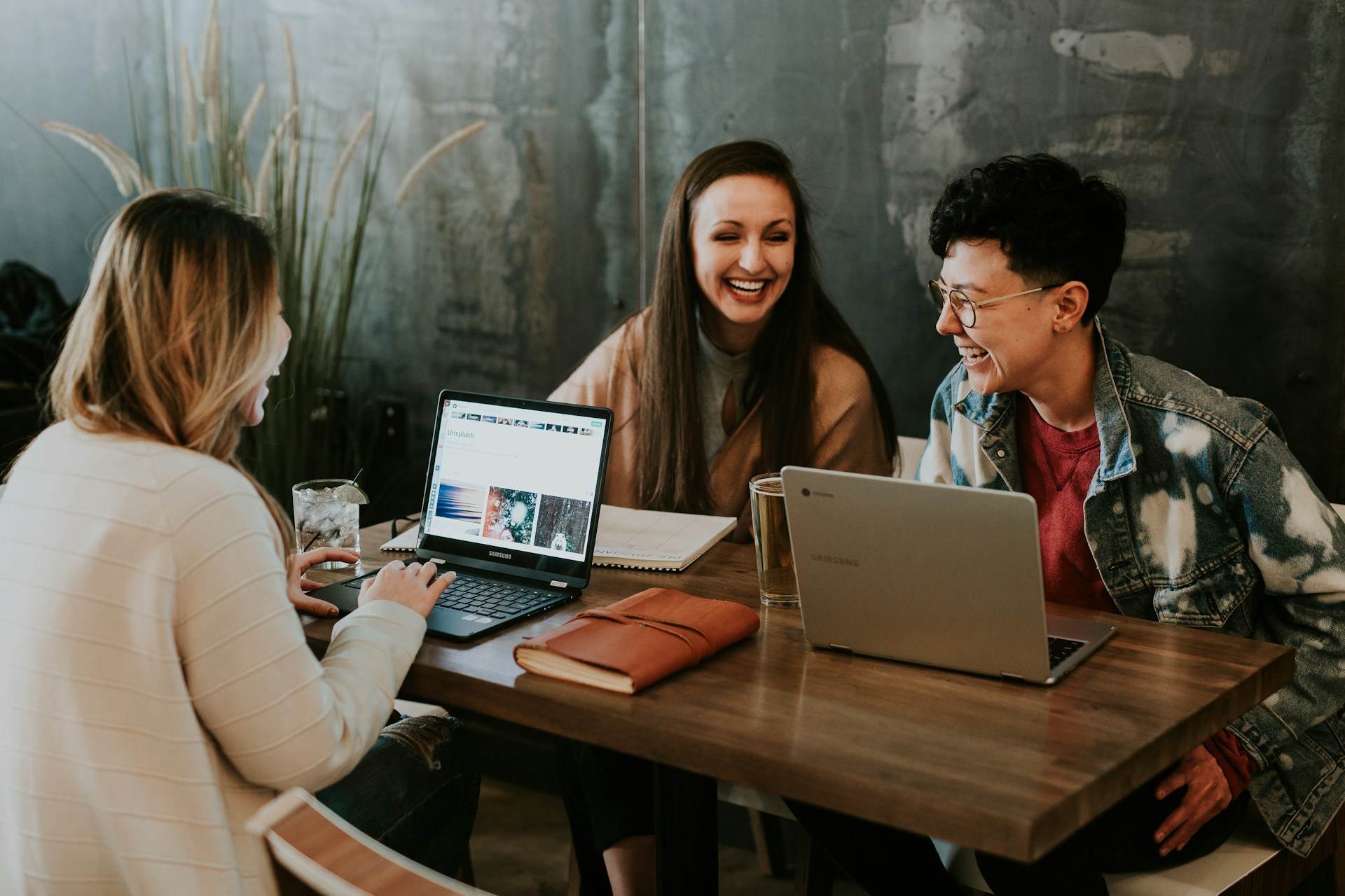 People sharing ideas around a table